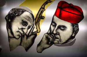 twarz Jana Pawła 2 i Kardynała Wyszyńskiego namalowana na szkle